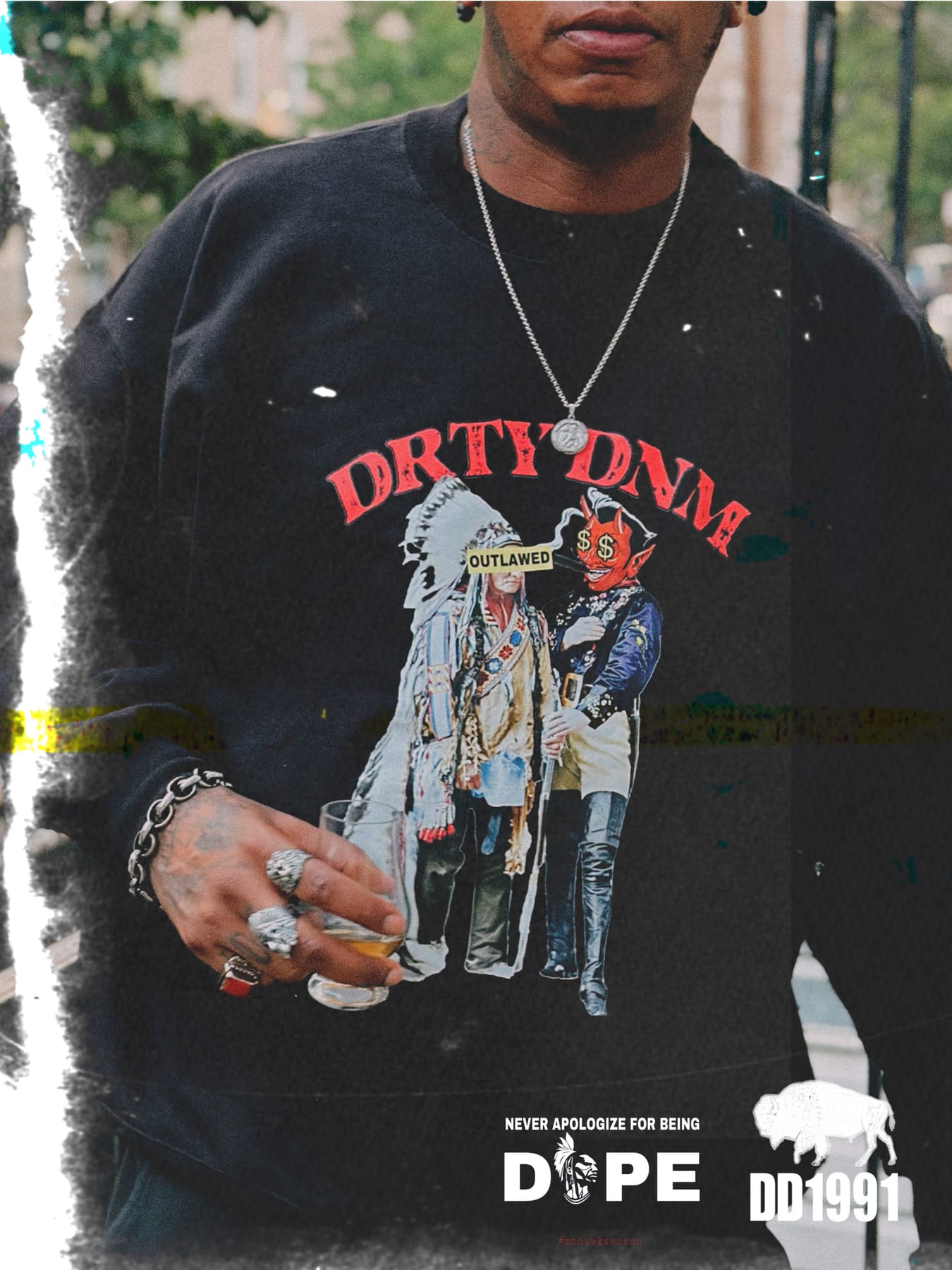 Bashir 'Salt' Henderson wearing a DRTYDNM crewneck in Brooklyn